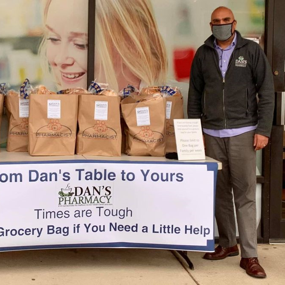 Dan's Wellness Pharmacy giving away groceries to their community