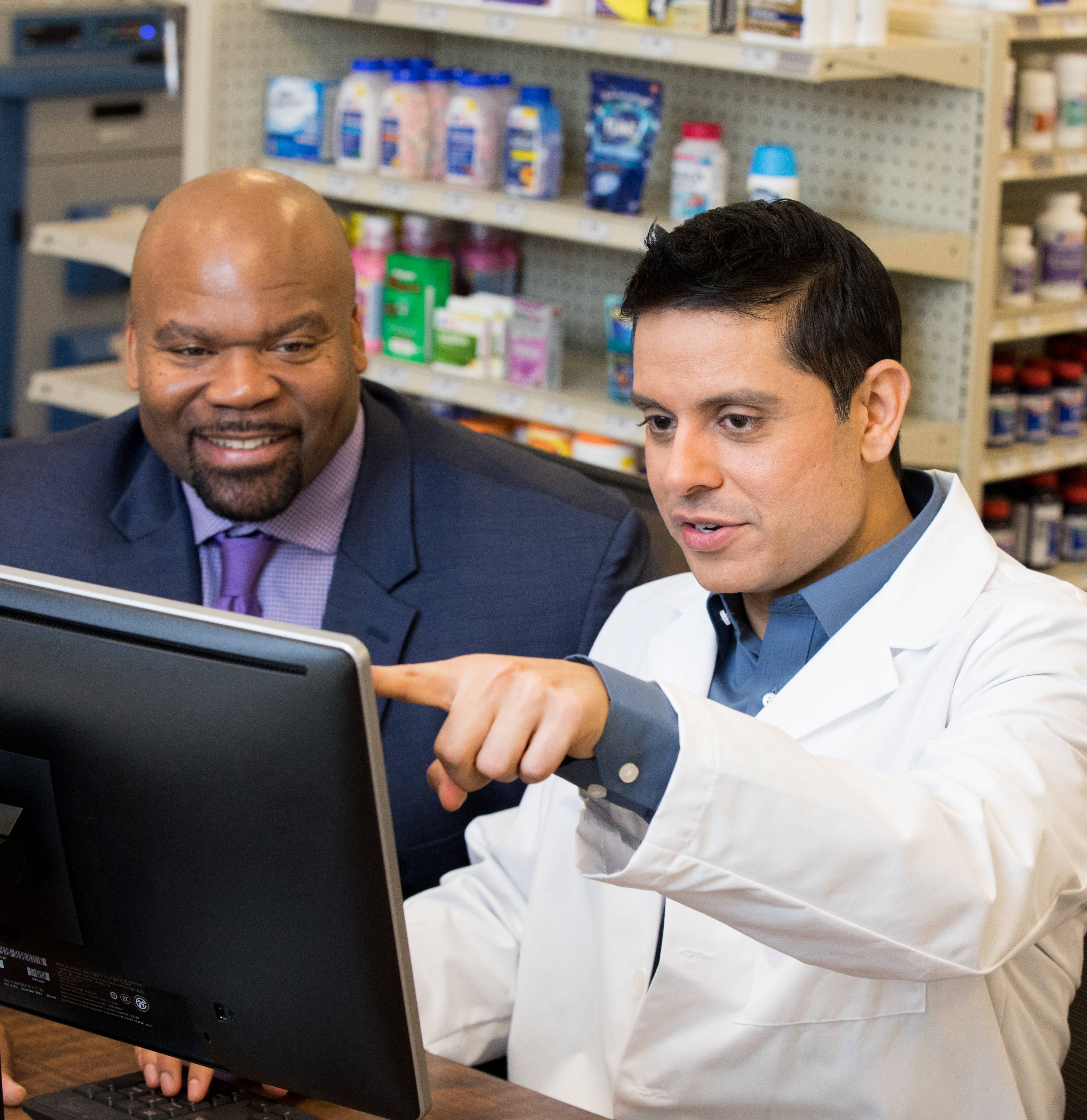 A Good Neighbor Pharmacy business coach helps a pharmacist use online programs to identify prescribers and patients to target