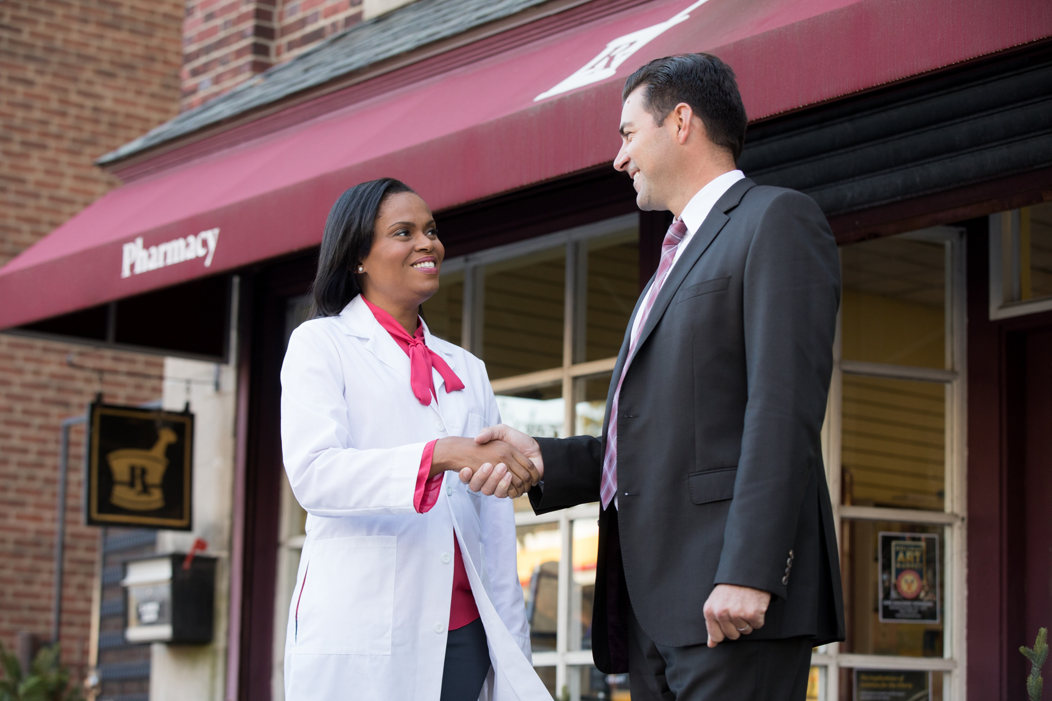A pharmacy buyer meeting with a pharmacy acquisition advisor